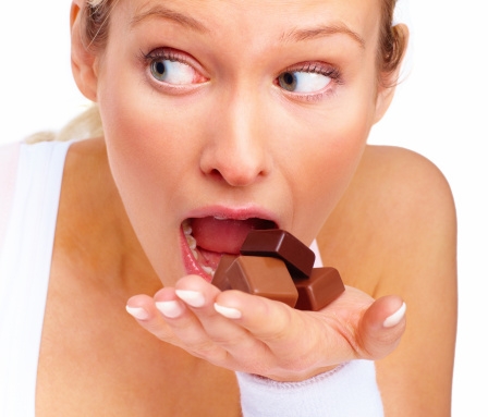 young-woman-eating-chocolates