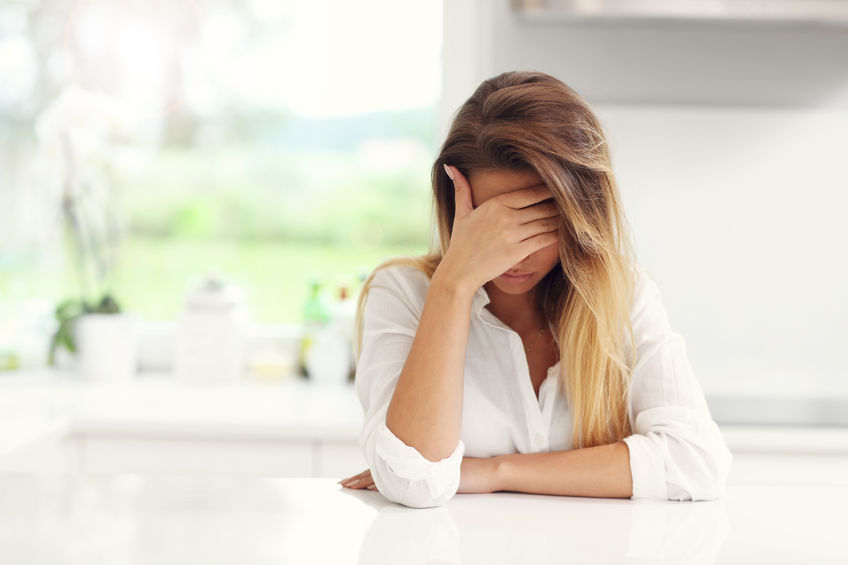61300034 - picture of young sad woman in the kitchen